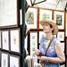 Chicago resident Margaret browses John Furches prints during the Ann Arbor Art Fair on South University Avenue on Saturday, July 20. She is in town visiting her step daughter Kim Wolske. Daniel Brenner I AnnArbor.com